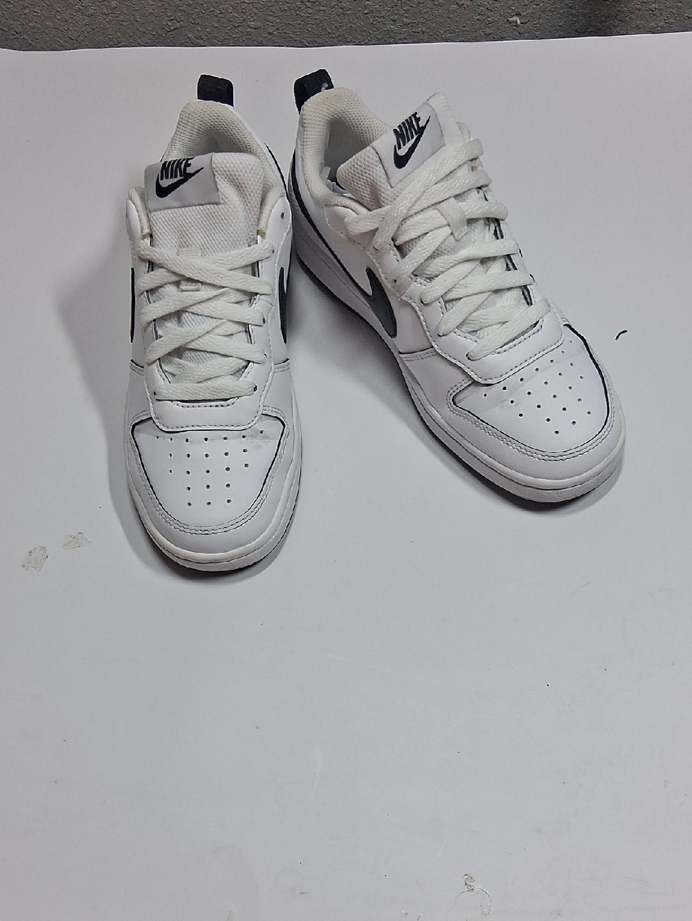 Nike White and Black Low Top Sneakers with Navy Swoosh